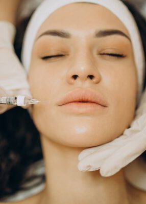 woman-making-injections-cosmetologist